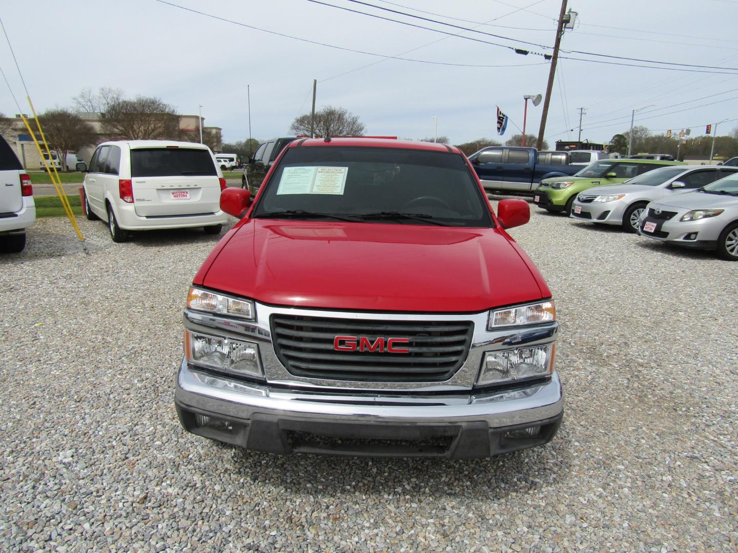 2012 Red /Gray GMC Canyon SLE Crew Cab 2WD (1GTD5MF9XC8) with an 2.9L L4 DOHC 16V engine, Automatic transmission, located at 15016 S Hwy 231, Midland City, AL, 36350, (334) 983-3001, 31.306210, -85.495277 - Photo#1